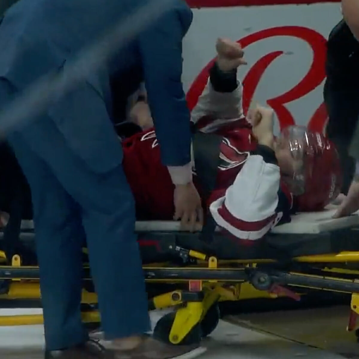 Arizona Coyotes' Clayton Keller injures leg, leaves on stretcher after  crashing into boards - ESPN