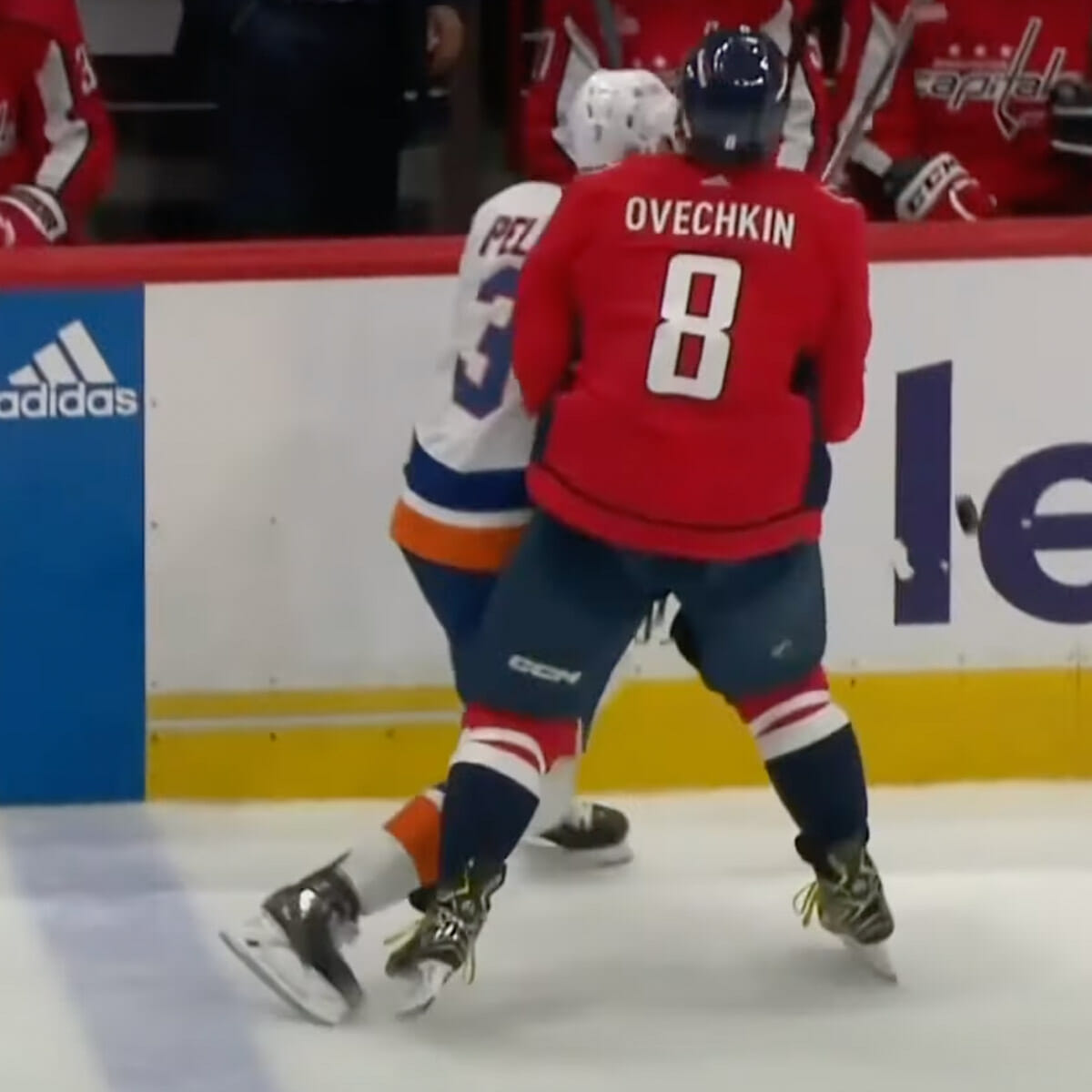 Alex Ovechkin causes injury scare with massive hit on Adam Pelech; fans  can't decide if it was clean or not