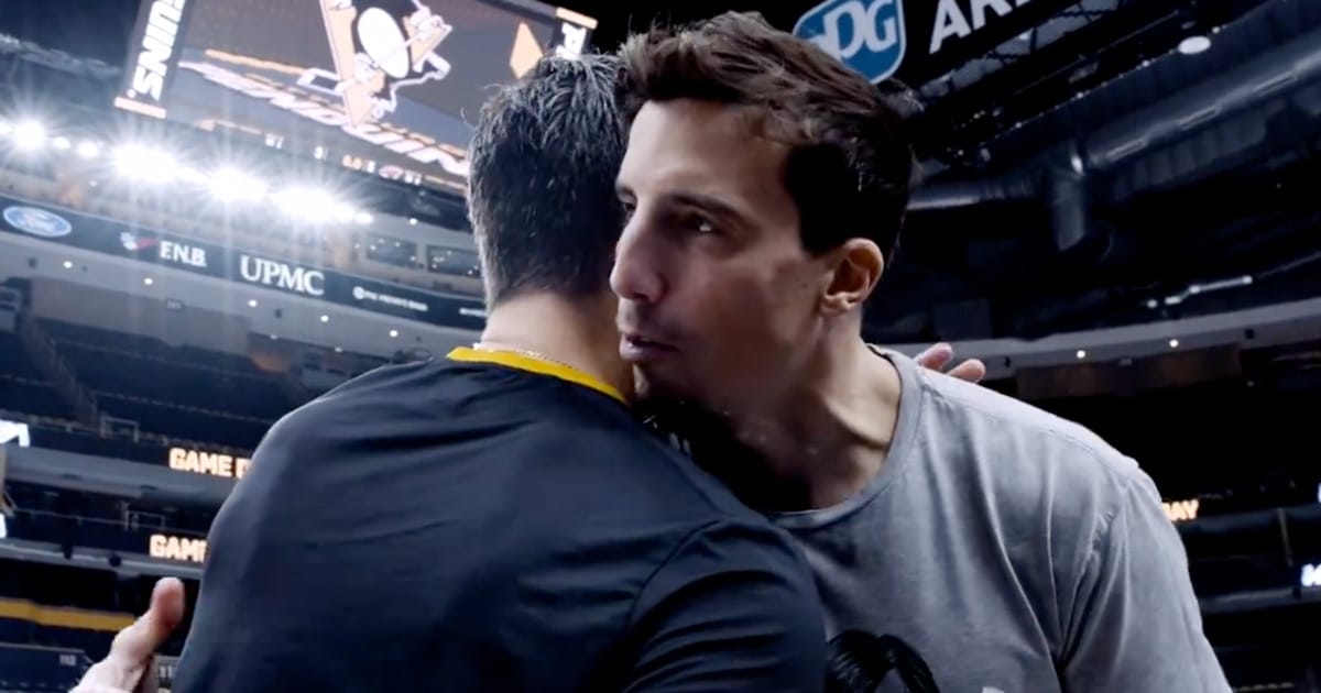 Sidney Crosby giving Marc-Andre Fleury a hug