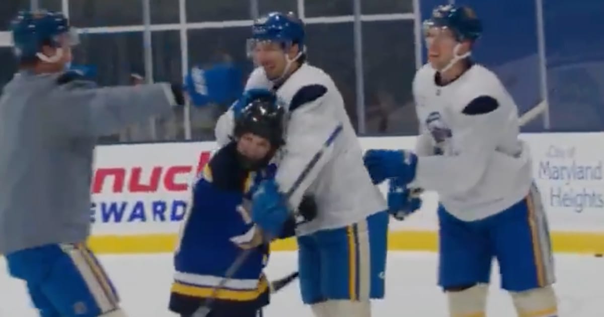 The St. Louis Blues celebrate during practice