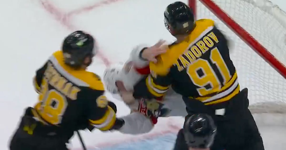 Nikita Zadorov of the Boston Bruins in a fight with Sam Bennett