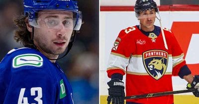 Quinn Hughes and Brad Marchand