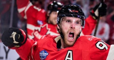 Connor McDavid celebrating a goal for Team Canada